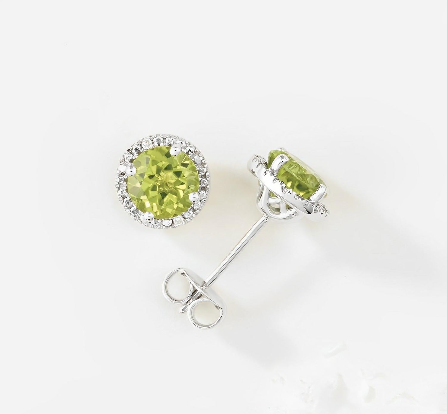 Peridot earrings with white gold and diamonds.