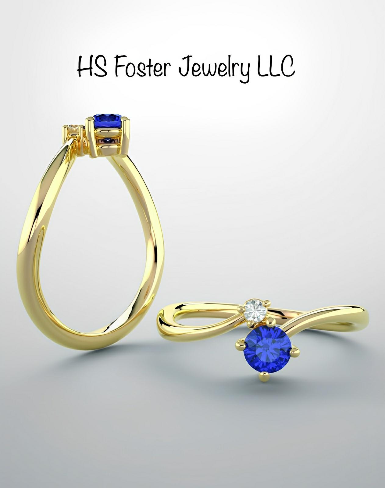 14kt yellow gold Natural sapphire and diamond ring.